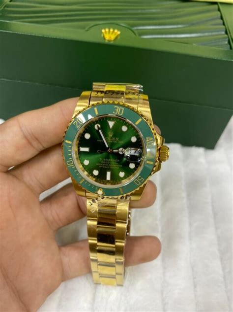 rolex submariner dourado e verde